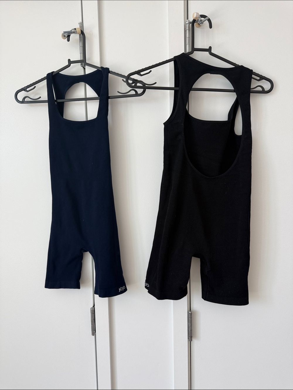 2 JOJA Sleeveless Scoop-Back Jumpsuit Romper in Black and Navy